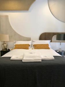 Łóżko lub łóżka w pokoju w obiekcie ApARTment Madrid