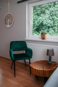 Posedenie v ubytovaní Szmaragdowy domek