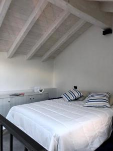 Katil atau katil-katil dalam bilik di Graziosa, Casetta in Valgerola