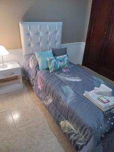 En eller flere senge i et værelse på casa lucia