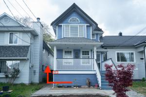 a house with an orange arrow on the front of it at Lovely 1BR Secondary suite with Separate entrance in New Westminster