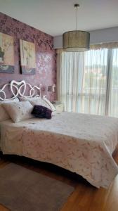 Postel nebo postele na pokoji v ubytování Apartamento Mirador de Padin