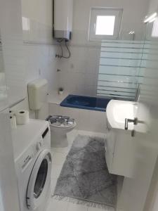 Koupelna v ubytování Apartmani Darko + 15 fotografií