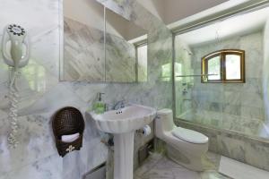 Um banheiro em Casa Las Palmas Hotel Boutique