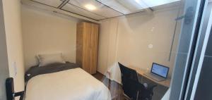 Postel nebo postele na pokoji v ubytování Portal Norte 170 ACOGEDORAS HABITACIONES CON TODOS LOS SERVICIOS