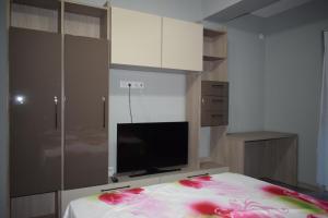 Ένα ή περισσότερα κρεβάτια σε δωμάτιο στο Apartament Parc Central RHBM