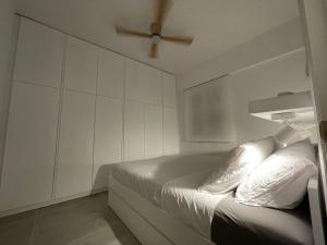Postel nebo postele na pokoji v ubytování Unique Suite