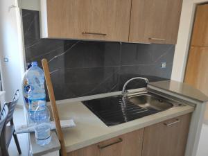 A kitchen or kitchenette at Fantasia B&B APARTAMENT STUDIO