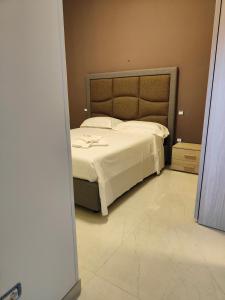 A bed or beds in a room at Fantasia B&B APARTAMENT STUDIO