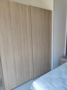 A bed or beds in a room at Fantasia B&B APARTAMENT STUDIO
