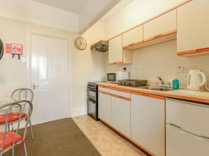 Η κουζίνα ή μικρή κουζίνα στο Clooneavin Apartment 5 +5 φωτογραφίες
