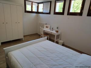 Postel nebo postele na pokoji v ubytování Pordoi H10