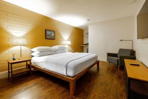Llit o llits en una habitació de Star Motel