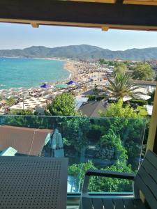 a view of the beach from the balcony of a condo at Athos Veranda in Sarti