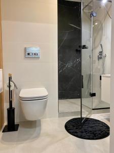 Et badeværelse på IX PIĘTRO - 9th floor apartment in Katowice