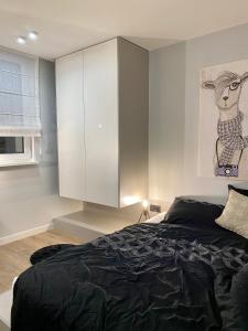 Posteľ alebo postele v izbe v ubytovaní IX PIĘTRO - 9th floor apartment in Katowice