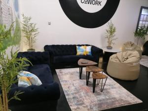 Uma área de estar em Hostel Boutique Merced 88