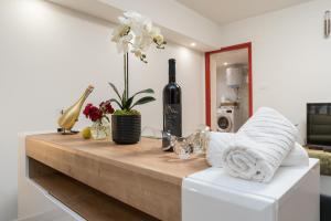 Televízia a/alebo spoločenská miestnosť v ubytovaní Studio Apartman Mirakul