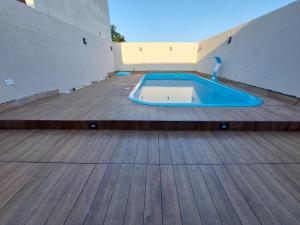 Foto da galeria de Balneário Céu Azul, com piscina a 350m da praia em Matinhos