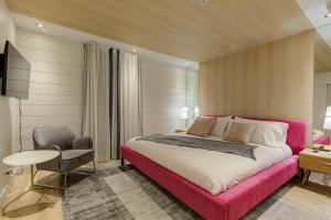 Giường trong phòng chung tại Les Immeubles Charlevoix 750-409