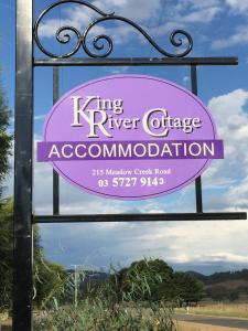 a sign that reads king river charge accommodation at King River Cottage in Moyhu