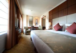 Cama o camas de una habitación en Hotel Metropolitan Tokyo Ikebukuro