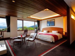 Postel nebo postele na pokoji v ubytování Hotel Chourakukan Kyoto Gion 長楽館 京都