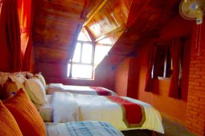 Letto o letti in una camera di Shivapuri Heights Cottage