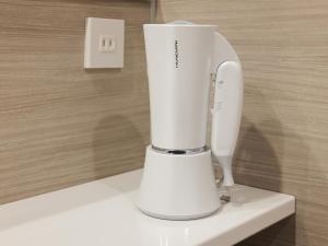 Příslušenství pro přípravu čaje a kávy v ubytování hotel androoms Naha Port