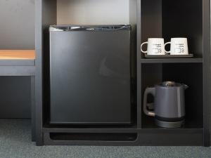 Příslušenství pro přípravu čaje a kávy v ubytování hotel androoms Naha Port