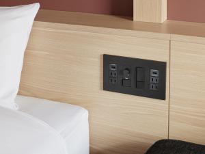 Postel nebo postele na pokoji v ubytování hotel androoms Naha Port