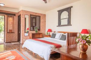 Letto o letti in una camera di Shivapuri Heights Cottage