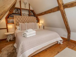 Ένα ή περισσότερα κρεβάτια σε δωμάτιο στο Chippy Cottage