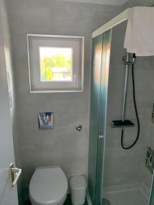 Kúpeľňa v ubytovaní TópART Apartman C