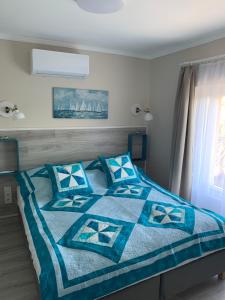Posteľ alebo postele v izbe v ubytovaní TópART Apartman C