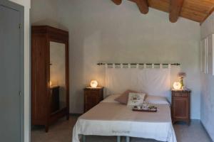 Posteľ alebo postele v izbe v ubytovaní La Meriggia Senigallia Agriturismo