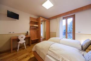 Ein Bett oder Betten in einem Zimmer der Unterkunft Lumen