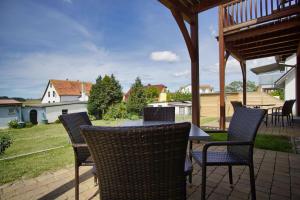 Ein Balkon oder eine Terrasse in der Unterkunft Schicke FeWo mit Terrasse, gratis Nutzung vom AHOI Erlebnisbad und Sauna in Sellin - Haus De niege Wech FeWo 01