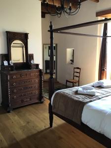 Llit o llits en una habitació de Le Château de Cambiaire