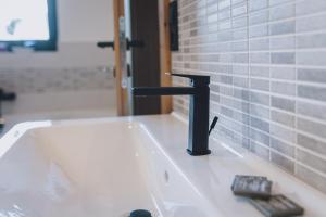 Łazienka w obiekcie Premium Apartments Areit by we rent, SUMMERCARD INCLUDED