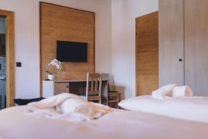 Łóżko lub łóżka w pokoju w obiekcie Premium Apartments Areit by we rent, SUMMERCARD INCLUDED