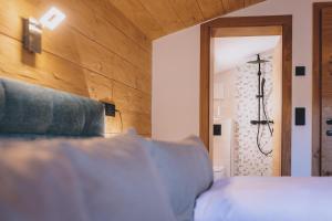 Łóżko lub łóżka w pokoju w obiekcie Premium Apartments Areit by we rent, SUMMERCARD INCLUDED