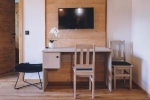 Telewizja i/lub zestaw kina domowego w obiekcie Premium Apartments Areit by we rent, SUMMERCARD INCLUDED
