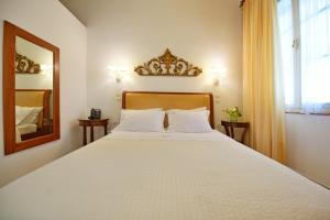 Posteľ alebo postele v izbe v ubytovaní Hotel Sophia
