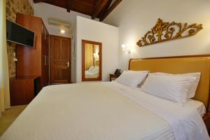 Posteľ alebo postele v izbe v ubytovaní Hotel Sophia