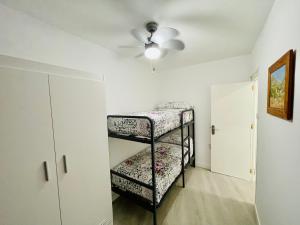Posteľ alebo postele v izbe v ubytovaní Ecclesia Major Apartment - Vivienda con Fines Turísticos Catedral de Jaen