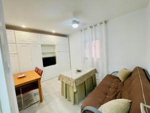 Televízia a/alebo spoločenská miestnosť v ubytovaní Ecclesia Major Apartment - Vivienda con Fines Turísticos Catedral de Jaen