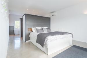 Ein Bett oder Betten in einem Zimmer der Unterkunft Finca SON VADOR by Mallorca Villa Selection