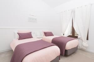 Ein Bett oder Betten in einem Zimmer der Unterkunft Finca SON VADOR by Mallorca Villa Selection