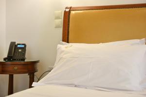 Posteľ alebo postele v izbe v ubytovaní Hotel Sophia